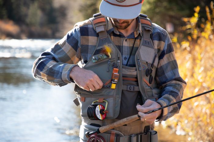 fishing vest with rod holder The Ultimate Fly by Raprance Customizable Comfort for The Adventurous Angler ring on the back to attach a fishing net and a variety of attachment loops allow you to carry all your gear. Multipurpose Good for any type of angler.Such as fly fishing Perfect Hatch The Opener Fishing